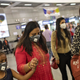 Commuters wearing protective masks rush to board metro trains at a station, amid coronavirus disease (COVID-19) fears, in New Delhi, India, March 13, 2020. REUTERS/Danish Siddiqui